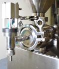 Used Wenzhou Rigao Table Top Semi Automatic Piston Filler, Model DYF. 316L Stainless steel product contact. Filling speed 5 to 20 bottles per minute. Filling accuracy /= 1% +/-. Filling range: approx...